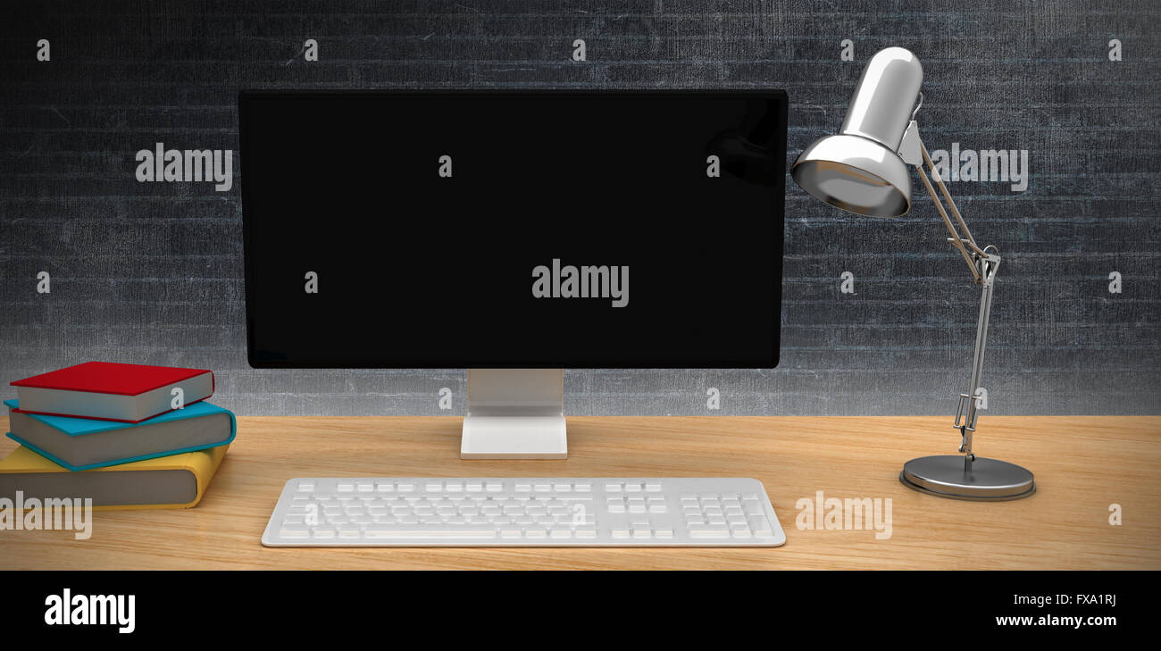 Composite image of a computer over a desk Stock Photo - Alamy