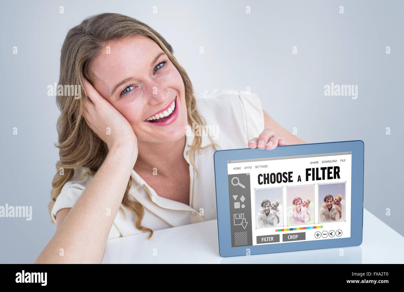 Woman man laughing looking tablet hi-res stock photography and images ...