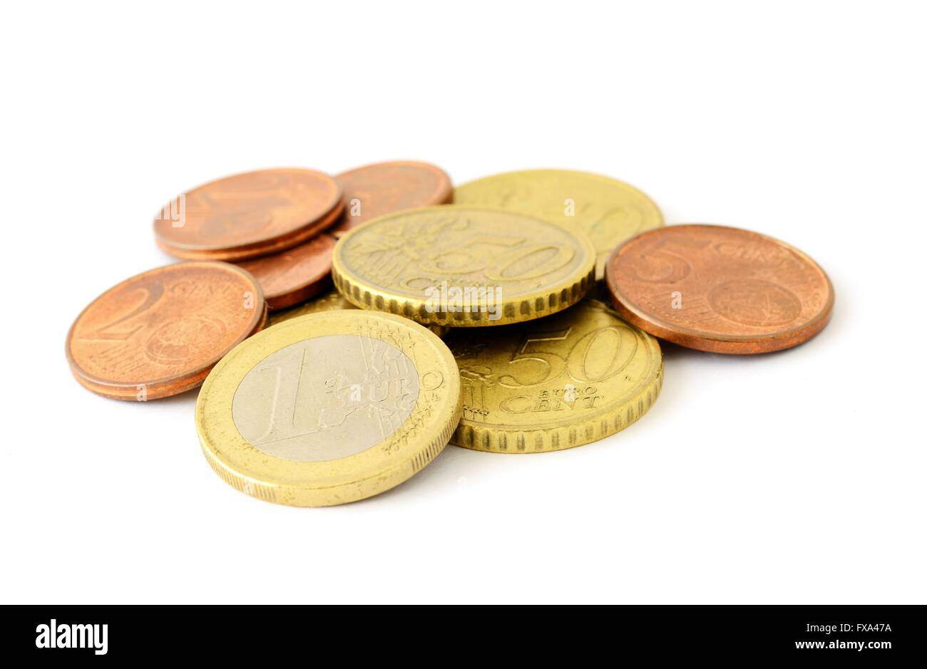The pile of Euro coins in various nominal value on a white background