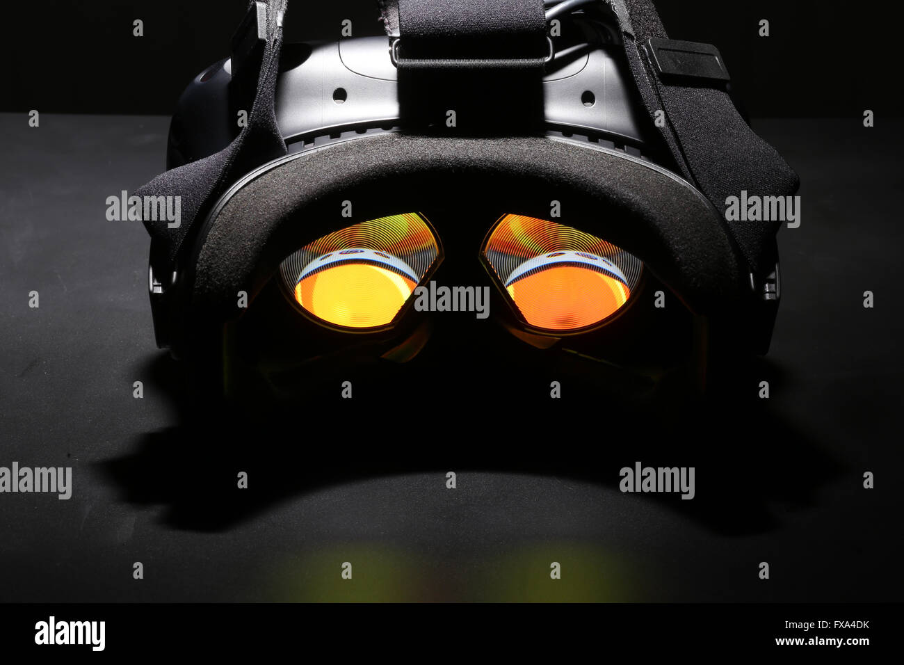 Virtual reality headset with glowing lenses Stock Photo