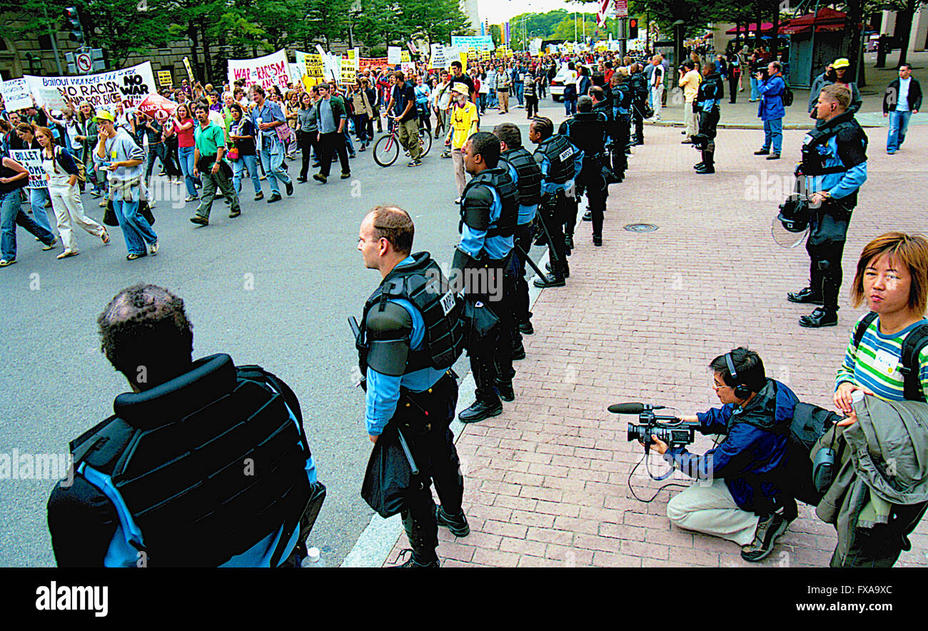 Washington, DC., USA, 20th April, 2002 Immigration rights protest march  in Washington DC.  DC police civil disobedience squad (riot squad) line up ready for action during an immigration protest rally. At 14th and Penn. Ave. NW  freedom plaza.  Credit: Mark Reinstein Stock Photo
