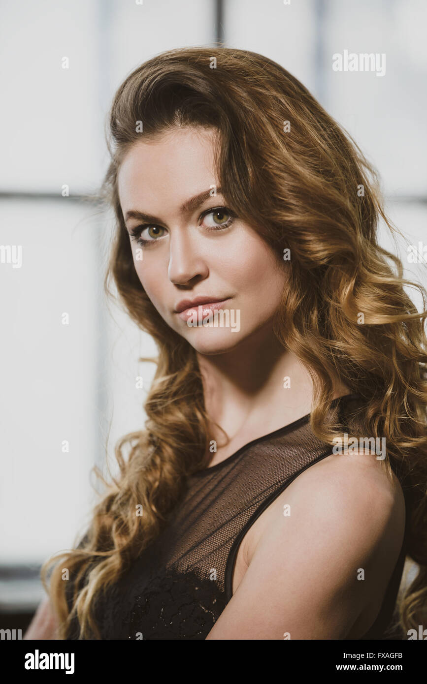 Portrait of beautiful woman with brown hair Stock Photo - Alamy