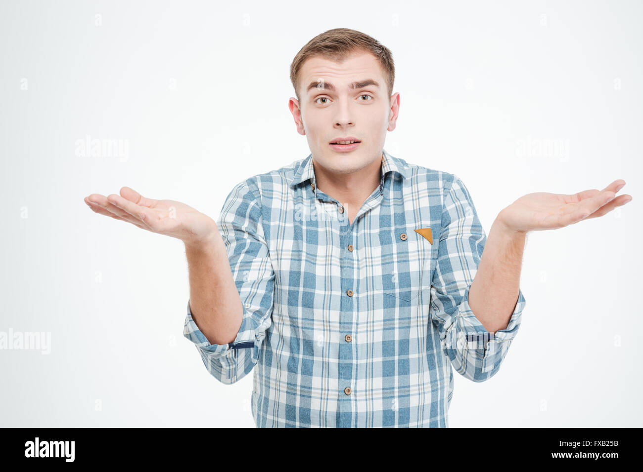 Confused doubtful young man looking hi-res stock photography and images ...