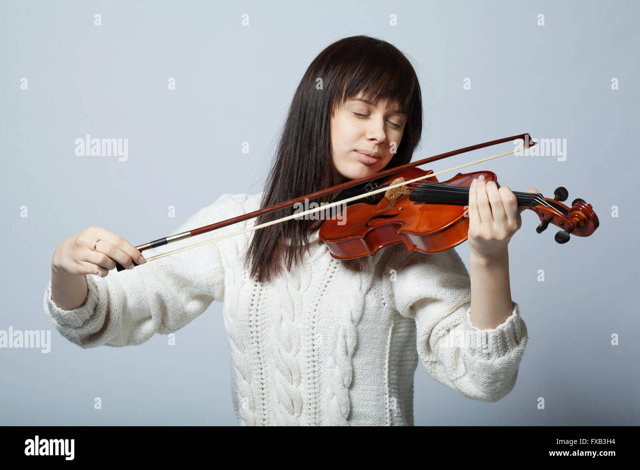 beautiful girl with violin studio shot Stock Photo - Alamy