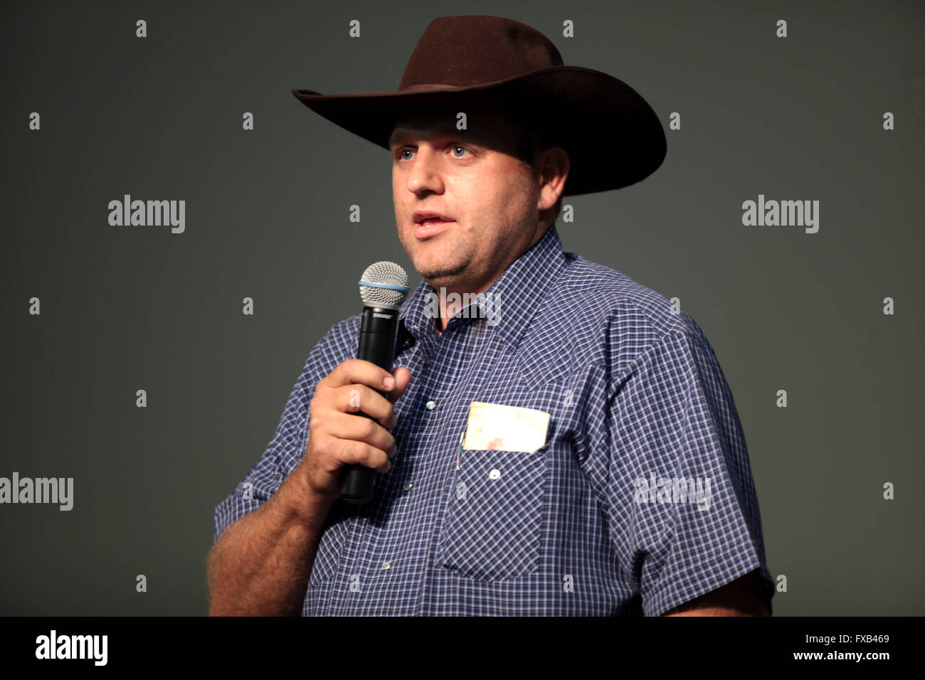 American cattle rancher and anti-government activist Ammon Bundy speaks during a forum hosted by the American Academy for Constitutional Education at the Burke Basic School July 22, 2014 in Mesa, Arizona. Stock Photo