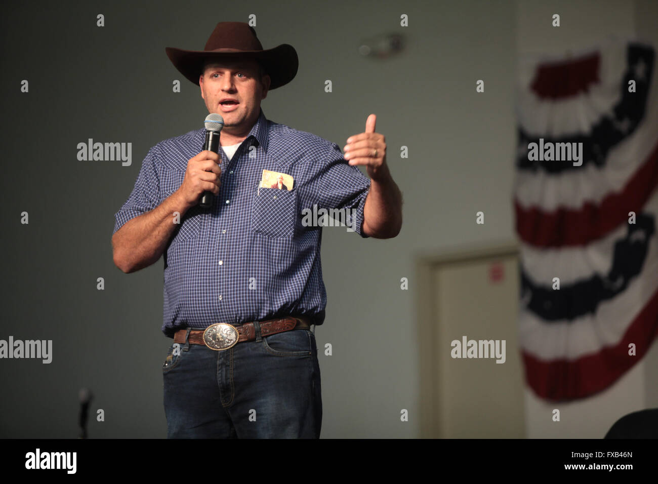 American cattle rancher and anti-government activist Ammon Bundy speaks during a forum hosted by the American Academy for Constitutional Education at the Burke Basic School July 22, 2014 in Mesa, Arizona. Stock Photo