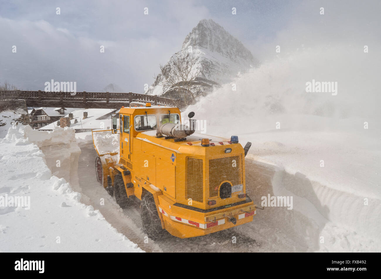 Snow plows begin the process of clearing roads leading to the historic