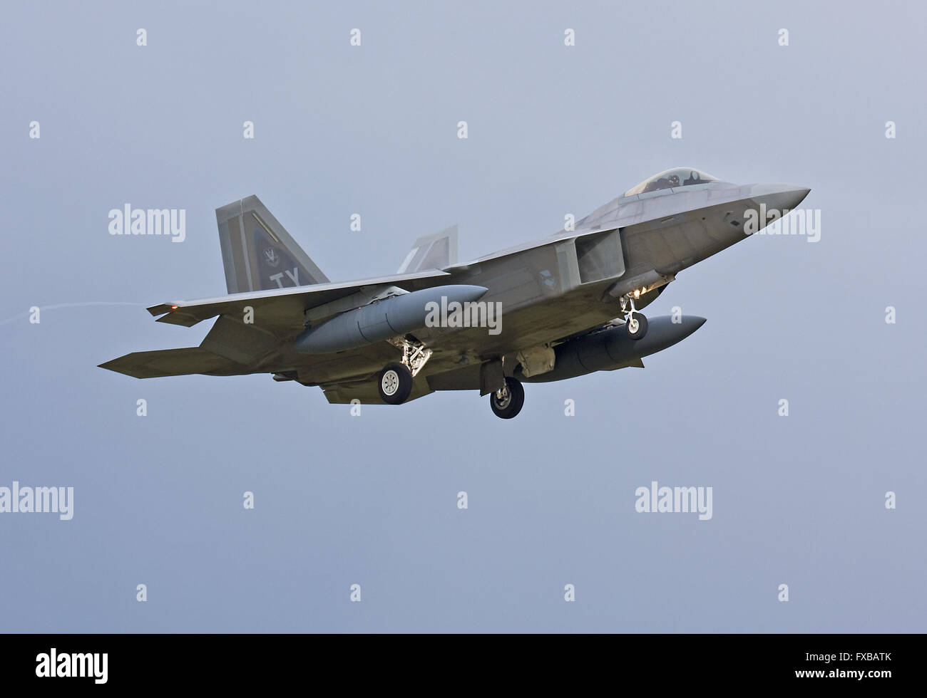 Tyndall AFB based USAF F-22 Raptor landing at RAF Lakenheath, England Stock Photo