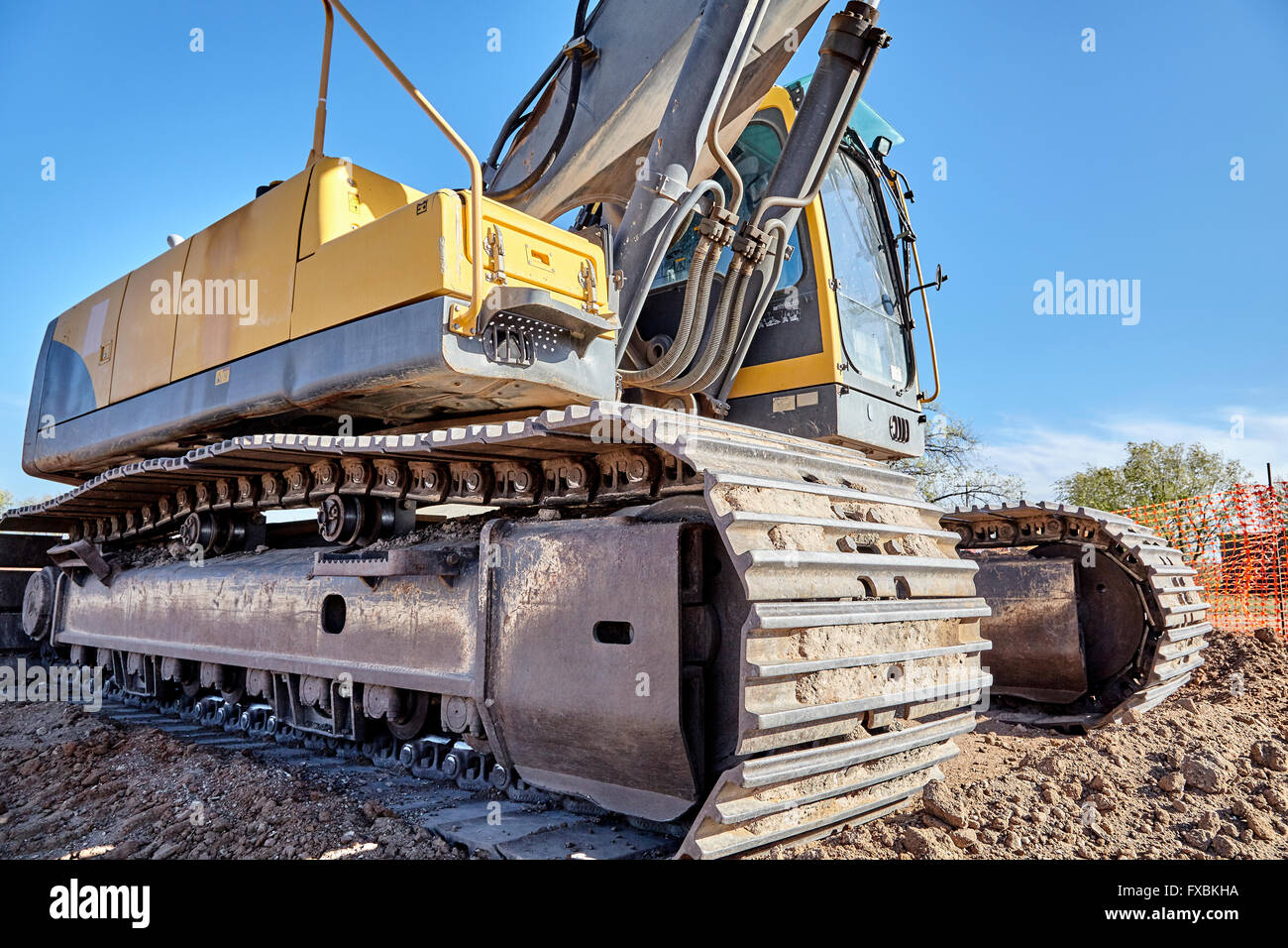 Industrial Heavy Equipment machine excavator road street jobsite Stock Photo