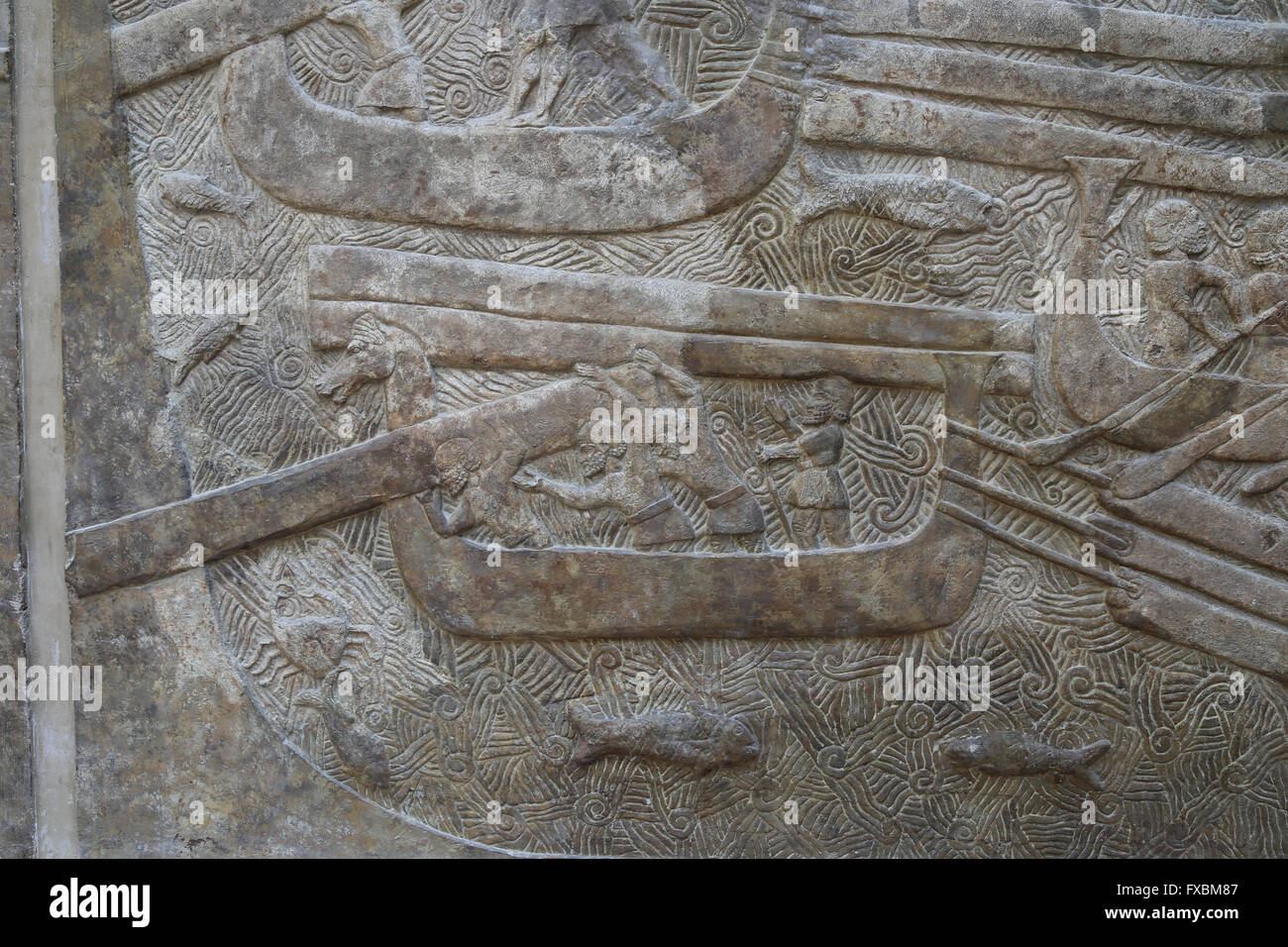 Slab. Transportation of timber (cedars of Lebanon, Phoenician civilization). Transport ships. Palace of Sargon II, Khorsabad. Stock Photo