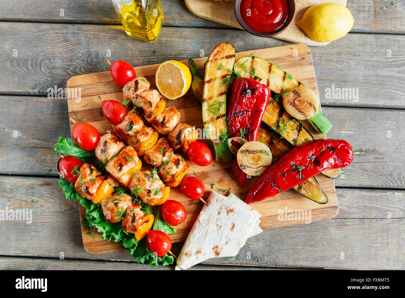 chicken kebab skewer with grilled vegetables barbecue Stock Photo