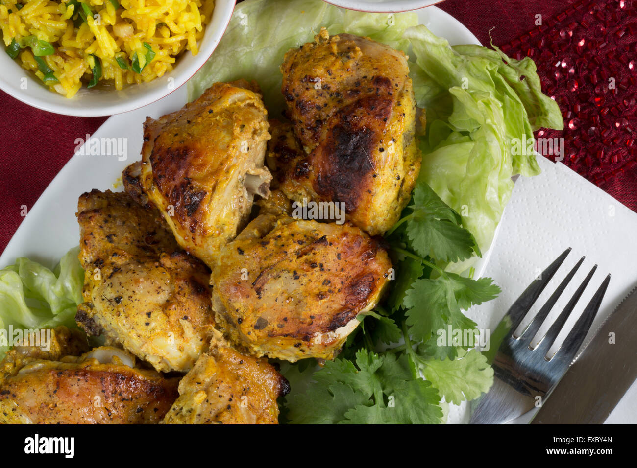 A homemade portion of Indian style Chicken Tandoori with Safron Rice Stock Photo
