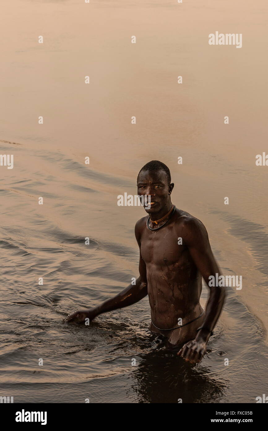 South Sudan. 22nd Feb, 2016. A Mundari man bathing in the Nile. Ankole