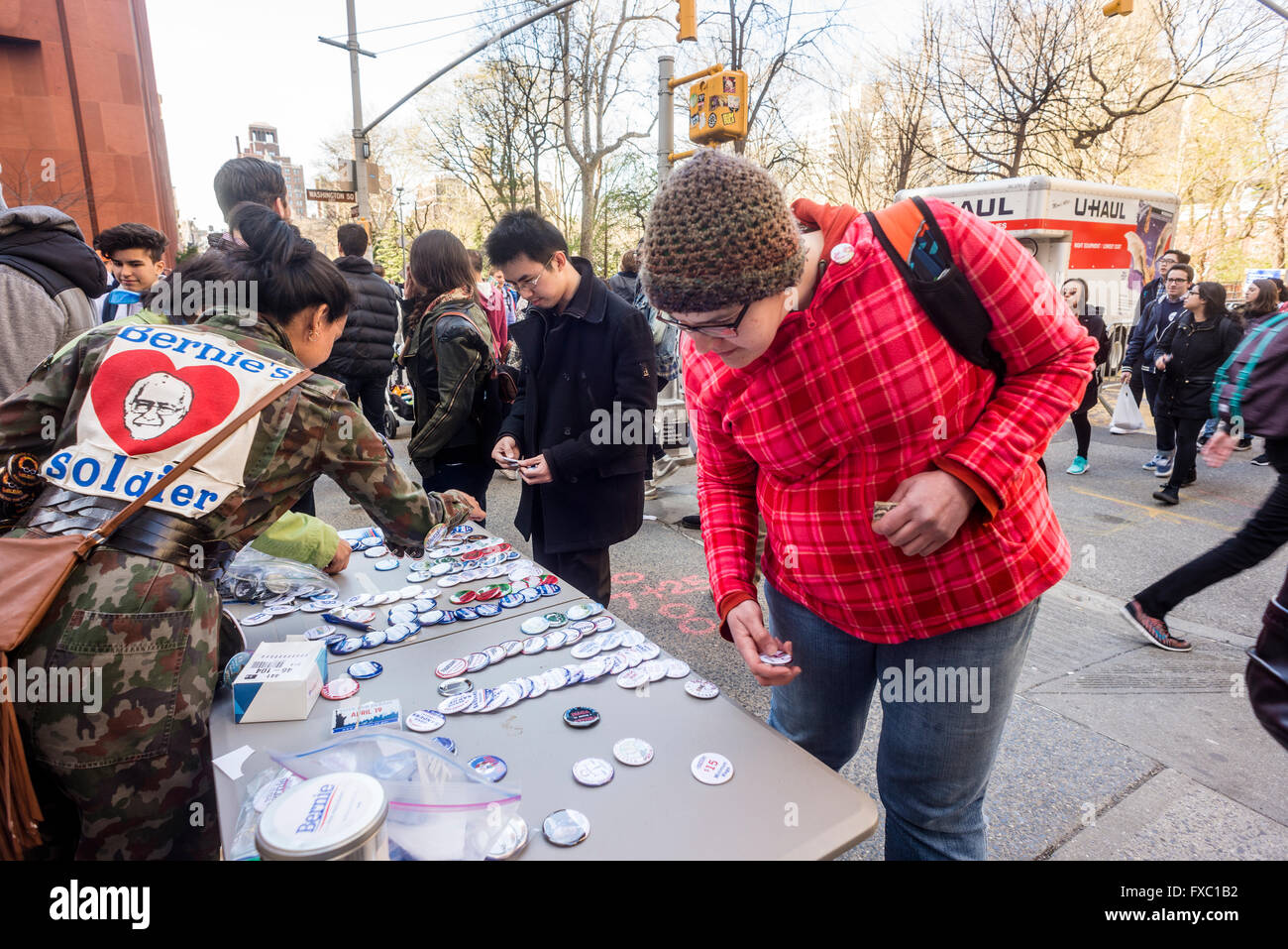 New York, USA. 13th April, 2016. Hours before a Bernie Sanders rally is scheduled to begin, supports sell buttons and other campaign paraphrenalia in Schwartz Plaza near Washingtom Square Park. Over 10,000 people are expected to attend the rally for the Democratic Presidential Candidate. Credit: Stacy Walsh Rosenstock/Alamy Live News Stock Photo