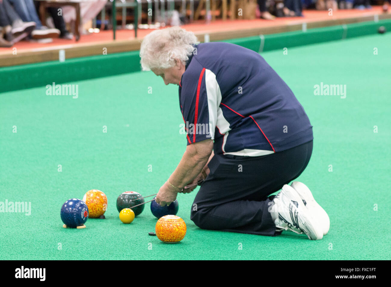 Melton Mowbray, Leicestershire,UK. 13th April 2016. English Indoor Bowling Association National Championships held at Melton and District Indoor Bowls Club. The quarter finals of the ladies and mens Nationa triples teams being played out. Credit:  Jim Harrison/Alamy Live News Stock Photo