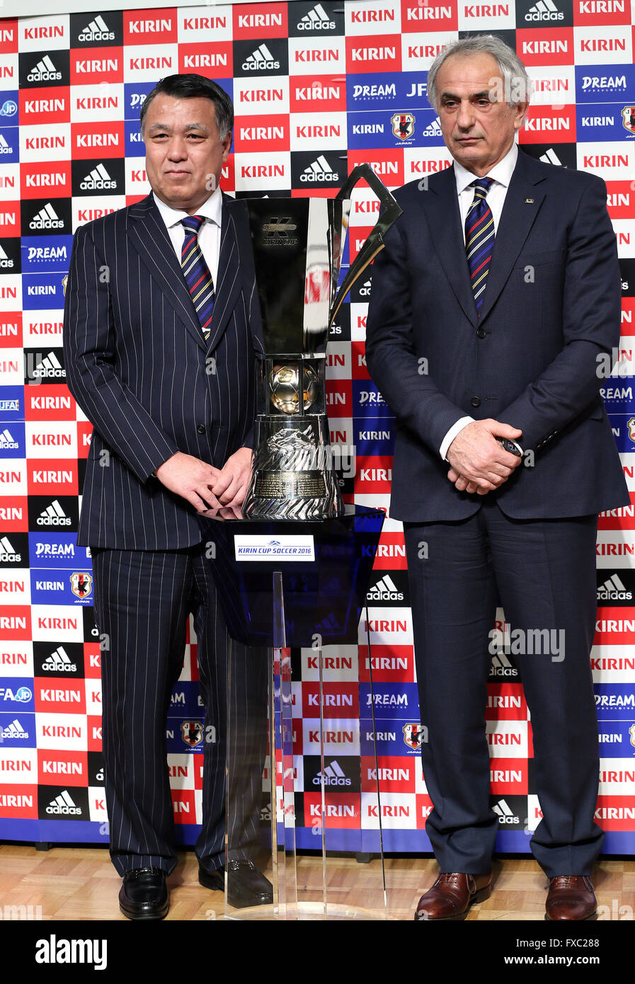 Tokyo, Japan. 13th Apr, 2016. Japan Football Association (JFA) new president Kozo Tajima (L) and national football team head coach Vahid Halilhodzic display the Kirin Cup as they announced Japan will have games against European teams at Kirin Cup football tournament in June at the JFA headquarters in Tokyo on Tuesday, April 13, 2016. Japan, Denmark, Bulgaria and Bosnia Herzegovina will have tournament in Toyota and Osaka. © Yoshio Tsunoda/AFLO/Alamy Live News Stock Photo