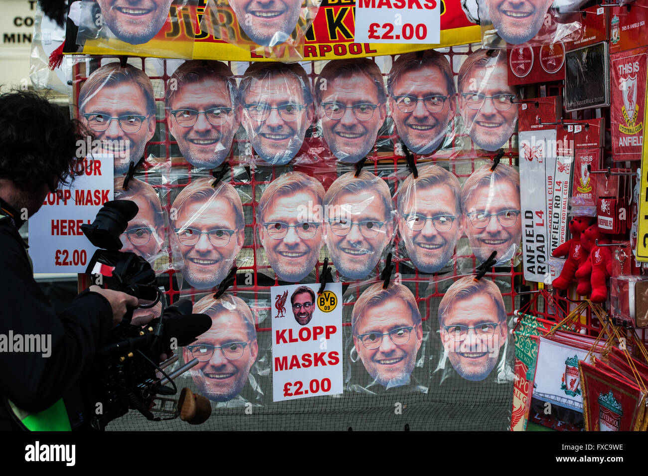 Posters with the face of Liverpool's coach Juergen Klopp are seen at a souvenir shop prior to the UEFA Europa League quarter finals soccer match between Liverpool FC and Borussia Dortmund at the Anfield stadium in Liverpool, north west Britain 14 April 2016. Photo: Bernd Thissen/dpa Stock Photo