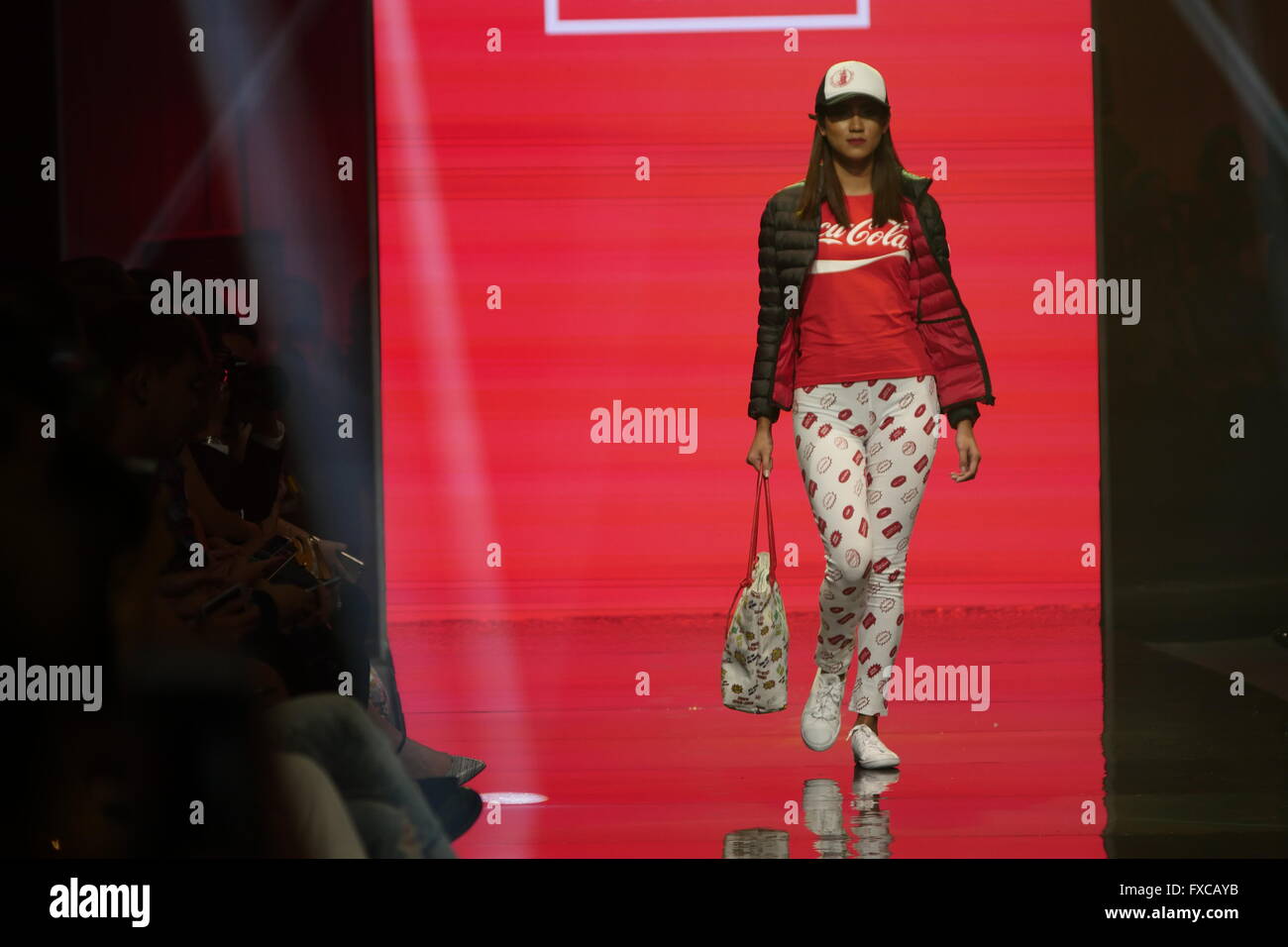 Mandaluyong, Philippines. 12th Apr, 2016. Model wears clothes inspired by Coca-Cola during the Manila Fashion Festival 2016. © George Buid/Pacific Press/Alamy Live News Stock Photo