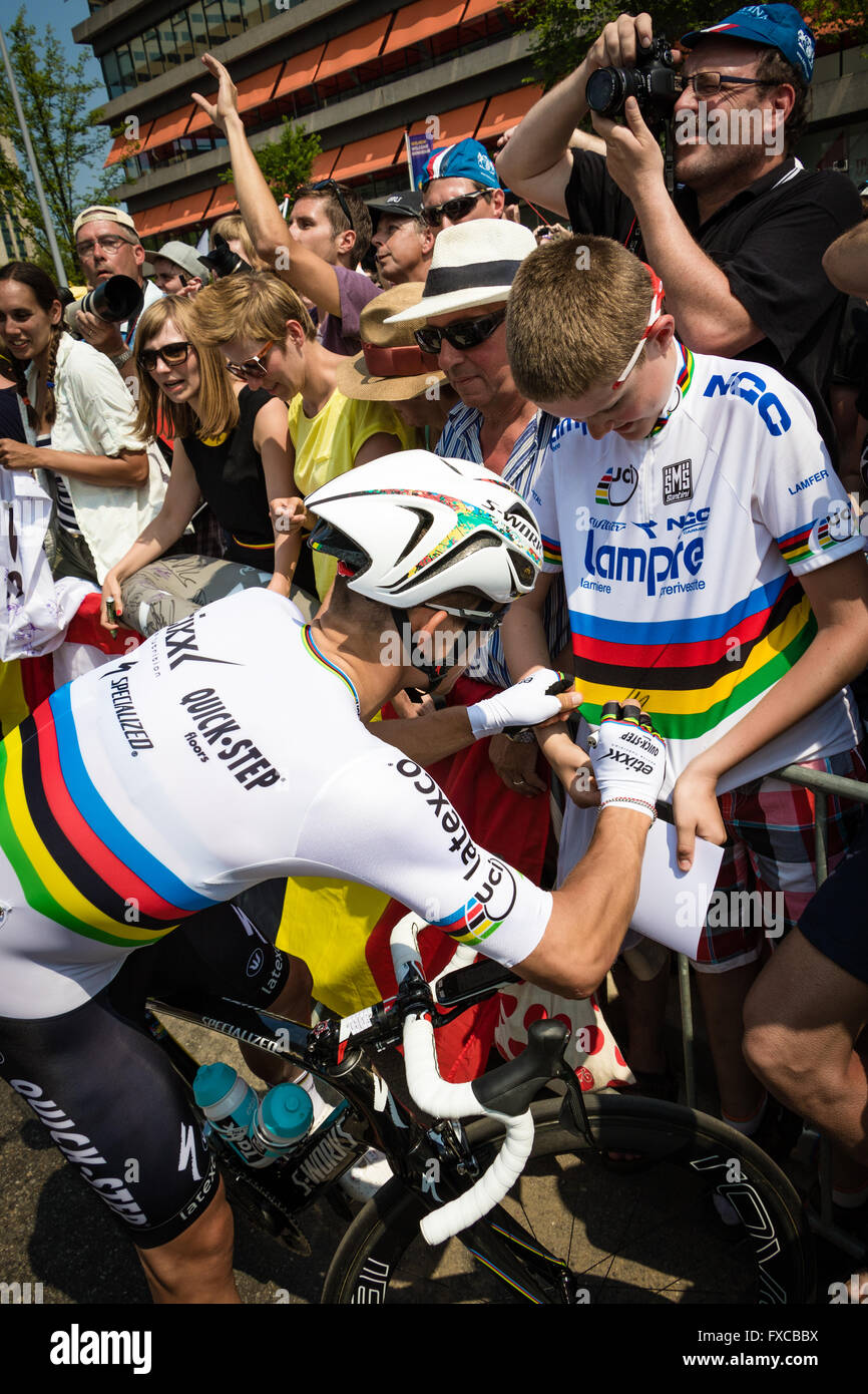 Utrecht, Netherlands. 5th July, 2015. Current UCI Road World Champion  Michal Kwiatkowski (Etixx-Quickstep) autographs a