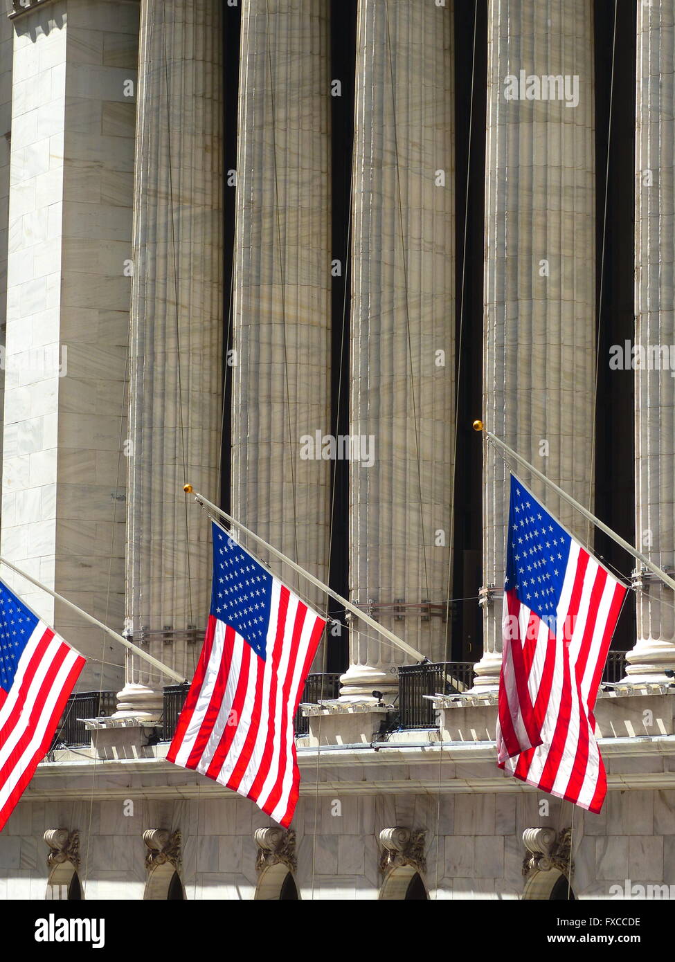 New York Stock Exchange with US flags Stock Photo
