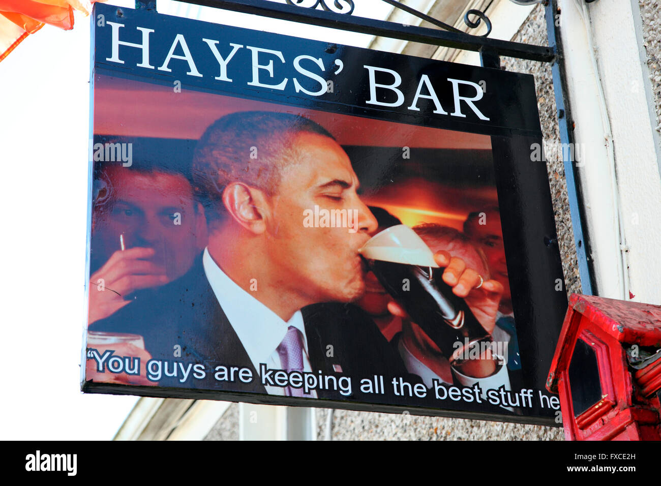 Hayes pub sign showing Barack Obama drinking Guinness Stock Photo