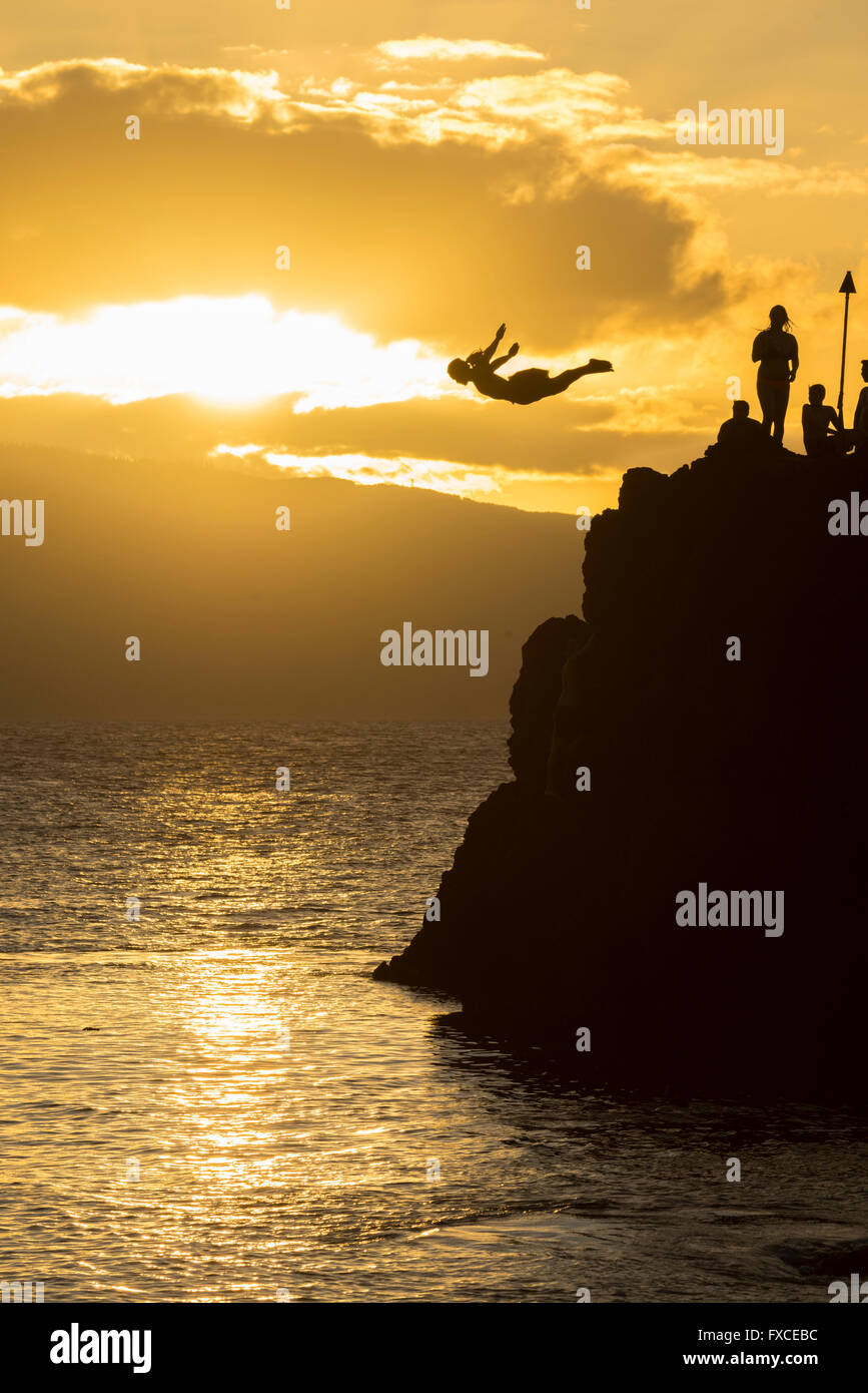 USA, Hawaii, Maui, Kaanapali Beach, Sheraton Maui Resort & Spa, sunset cliff dive ceremony Stock