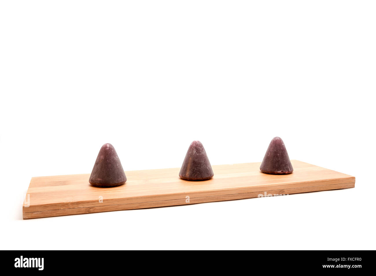 This pyramid shape of an cuberdons is a very tasty candy from Ghent Stock Photo