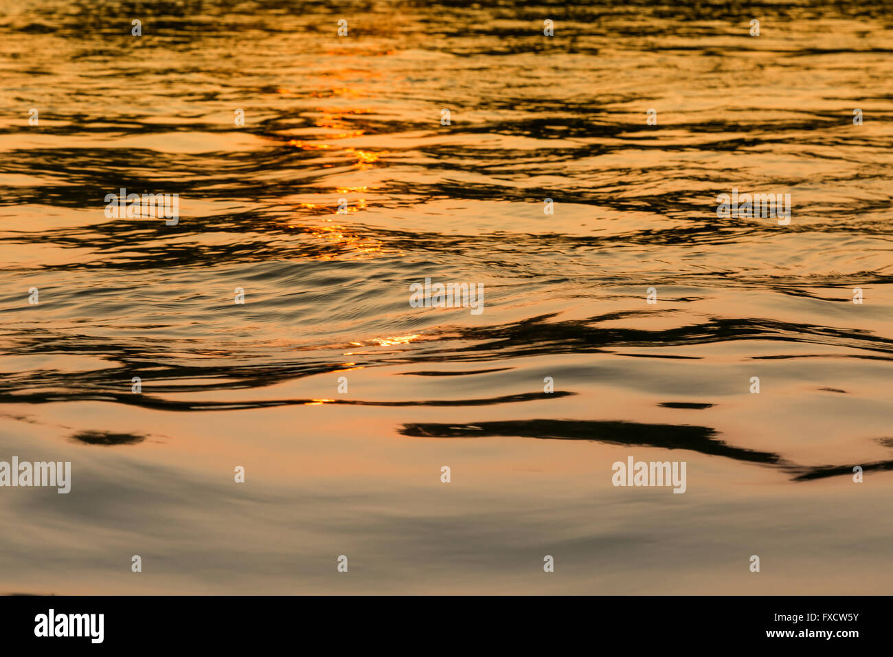 Sunset reflexion on the Mekong River at Four Thousand Island, Laos Stock Photo