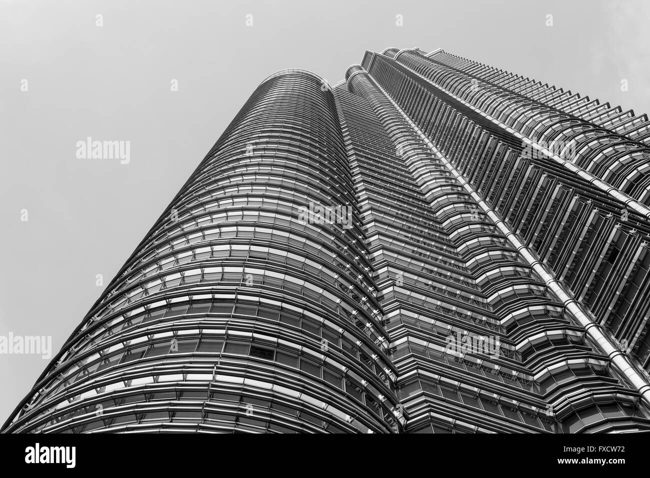 Kuala Lumpur, Malaysia - April: View of The Petronas Twin Towers and colorful water fountains Stock Photo