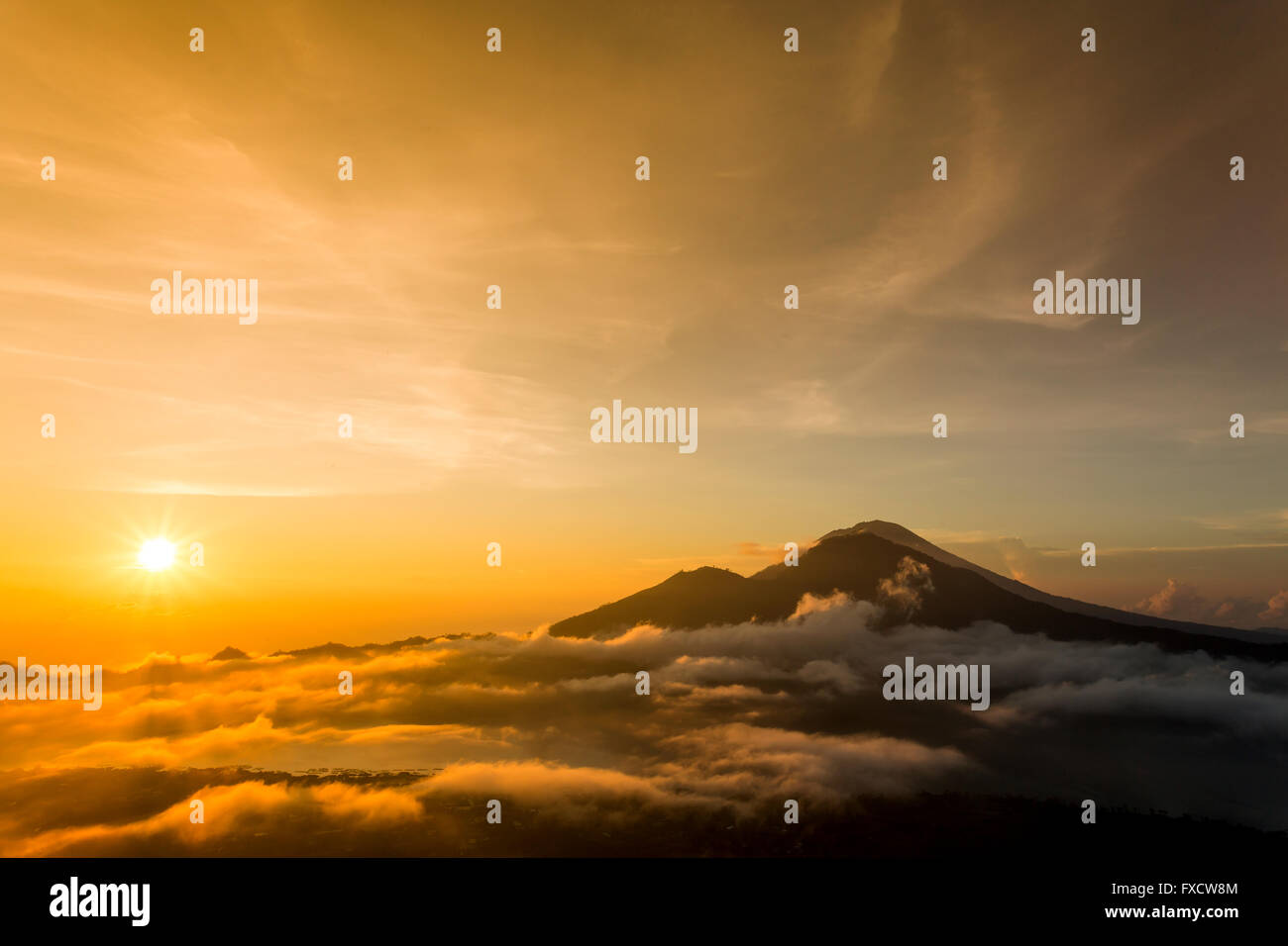 Sunrise from the top of Mount Batur - Bali, Indonesia Stock Photo - Alamy