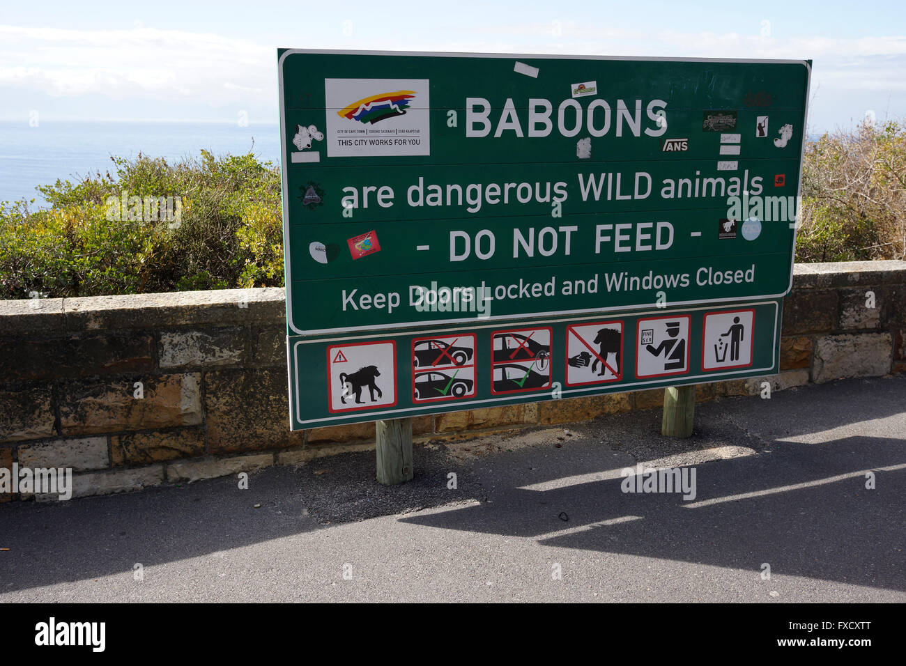 Public safety sign warning against feeding wild baboons, Muizenberg
