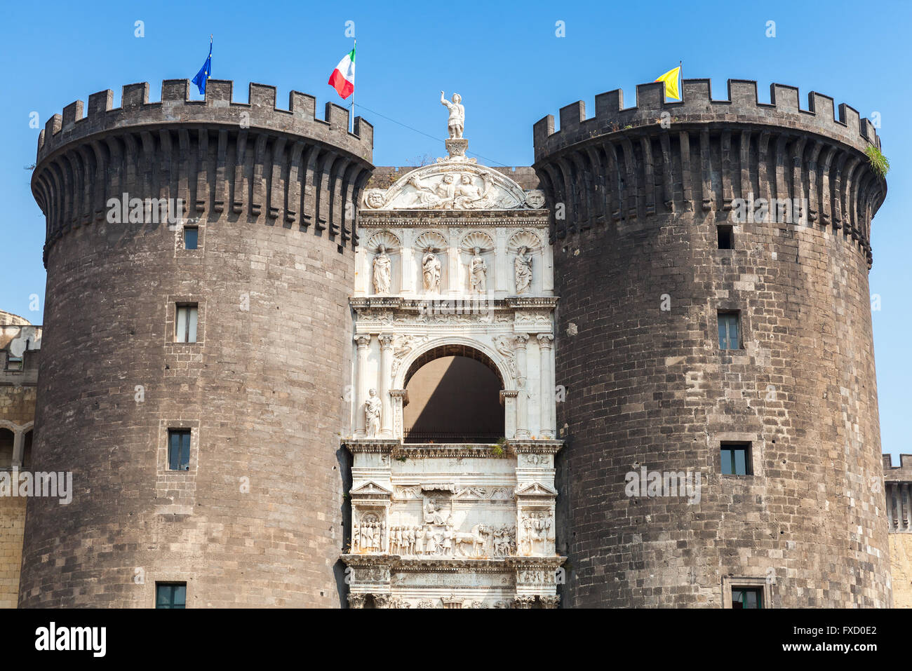Castel Nouvo. Main facade of medieval castle in Naples, Italy. It was first erected in 1279, now it is one of the main architect Stock Photo