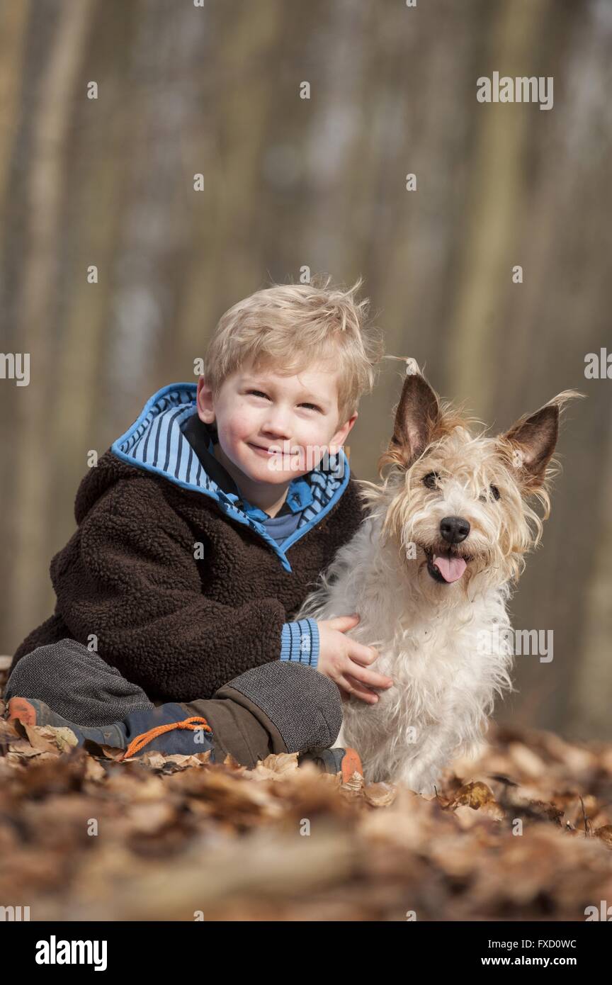 boy and mongrel Stock Photo