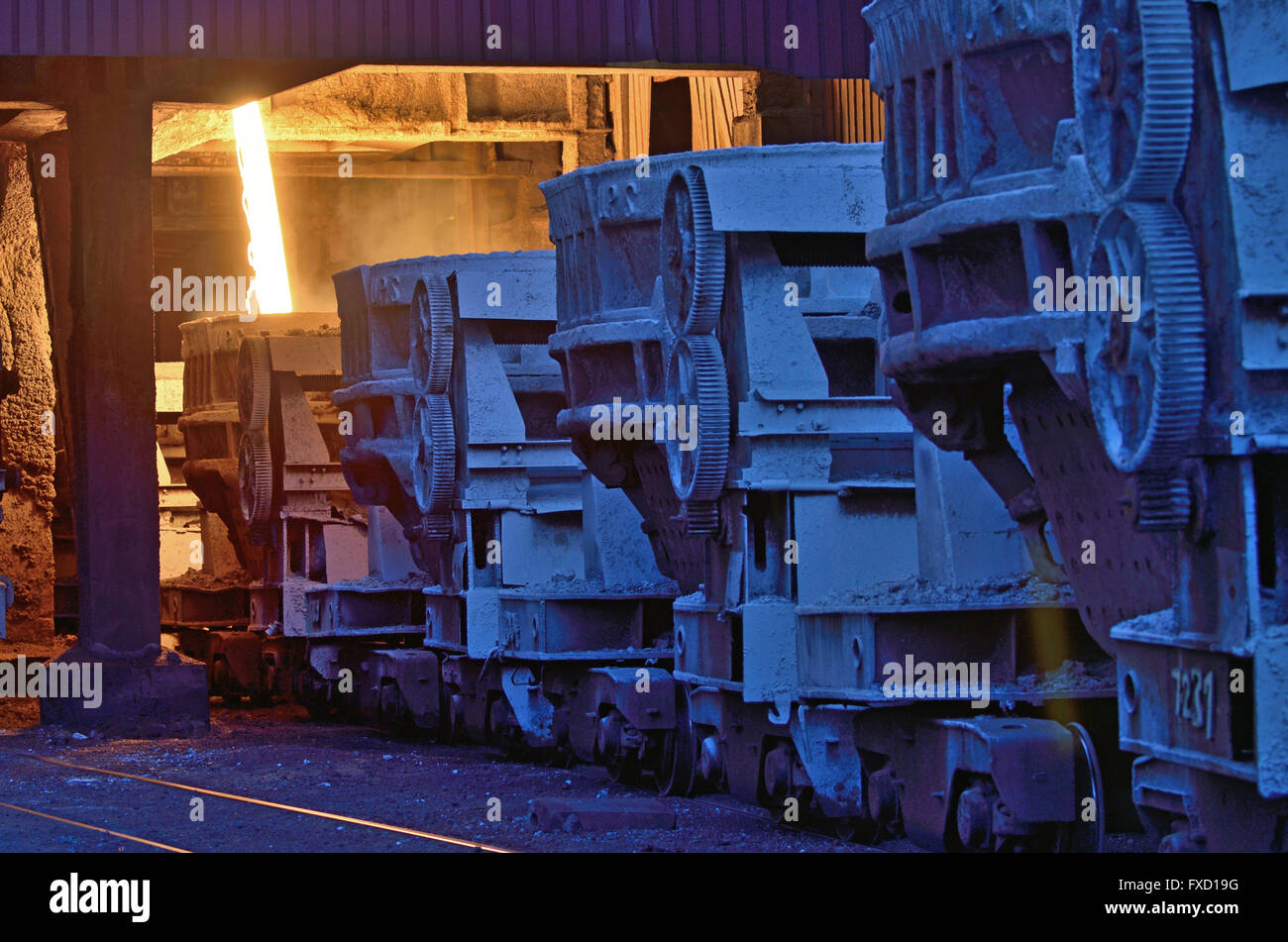 Hot metal ladle car transportation in steel plant Stock Photo