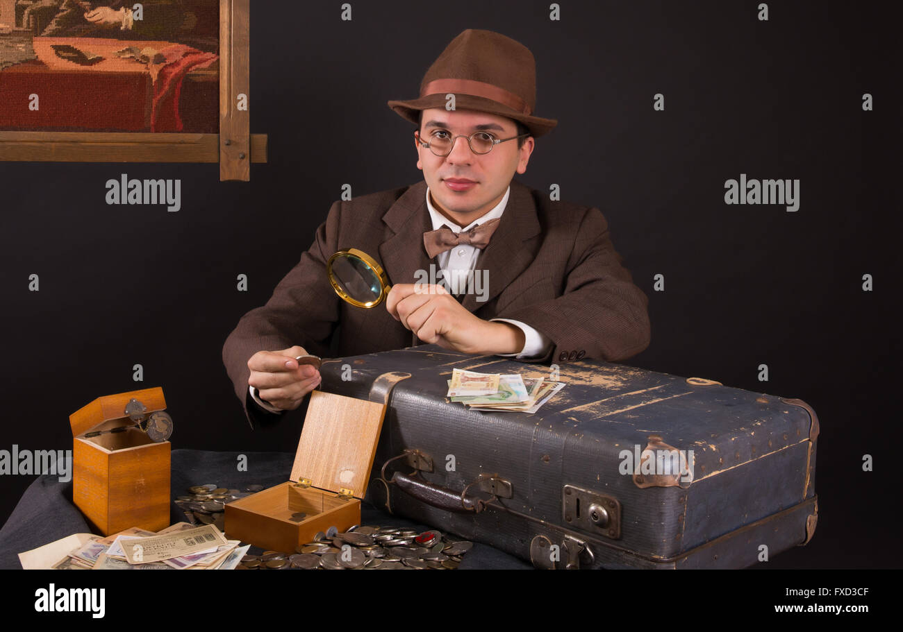 Numismatist with his coin collection Stock Photo Alamy