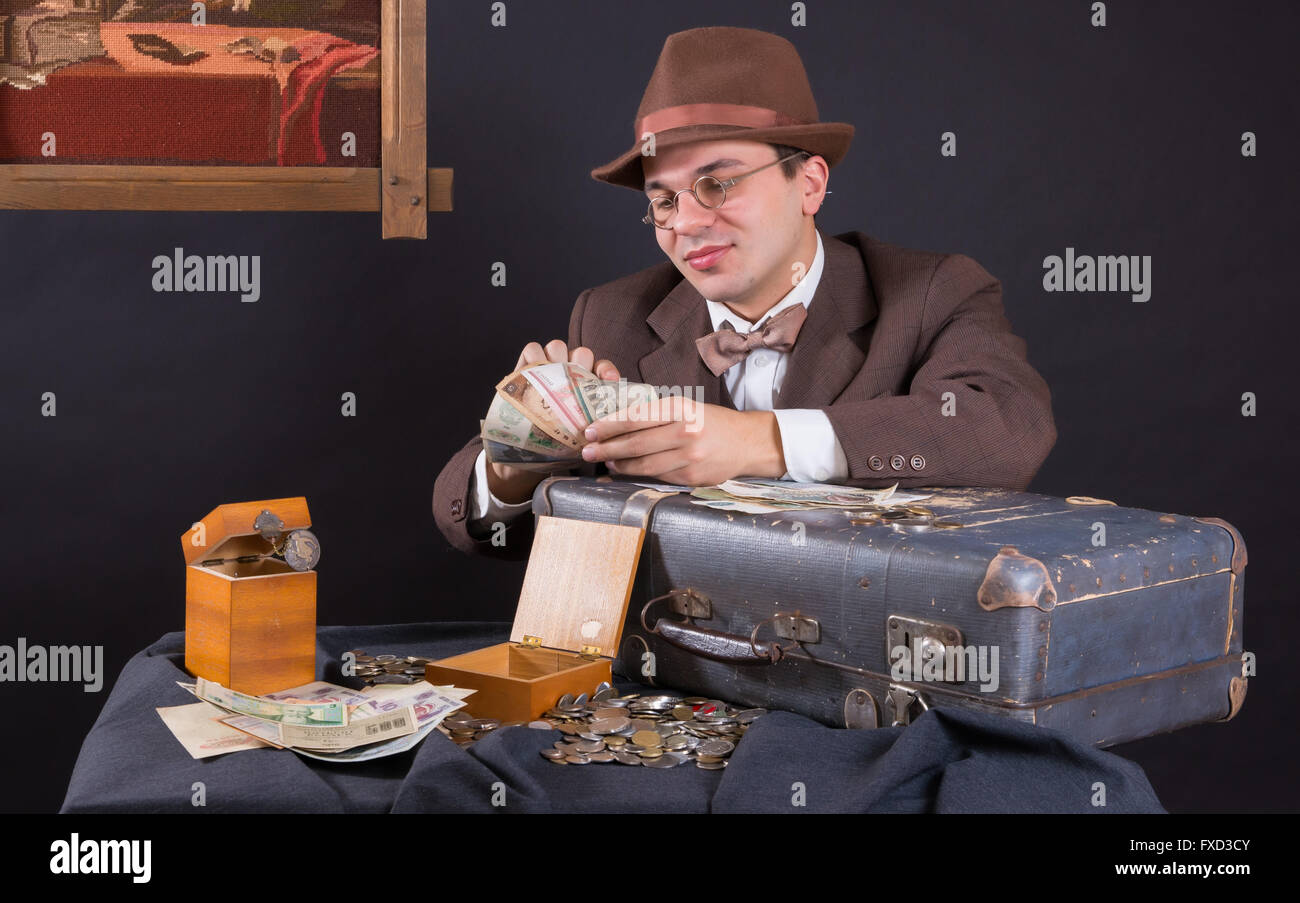 Numismatist with his coin collection Stock Photo Alamy