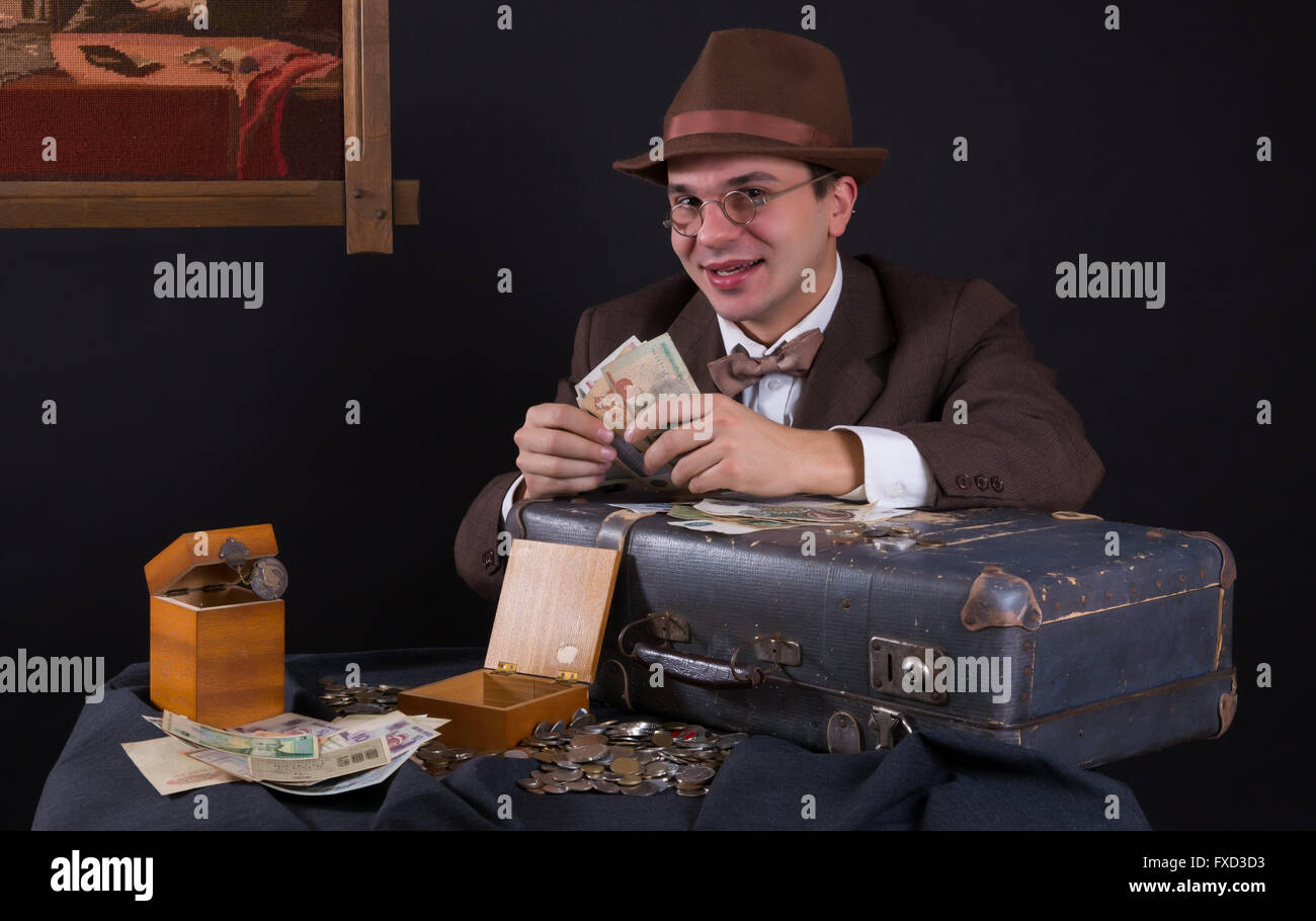 Numismatist with his coin collection Stock Photo Alamy