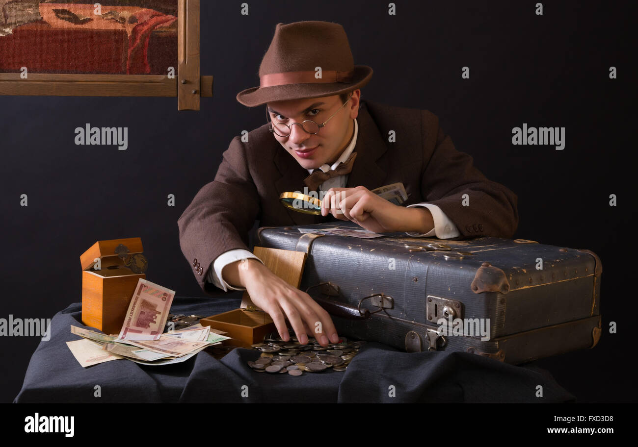 Numismatist with his coin collection Stock Photo Alamy