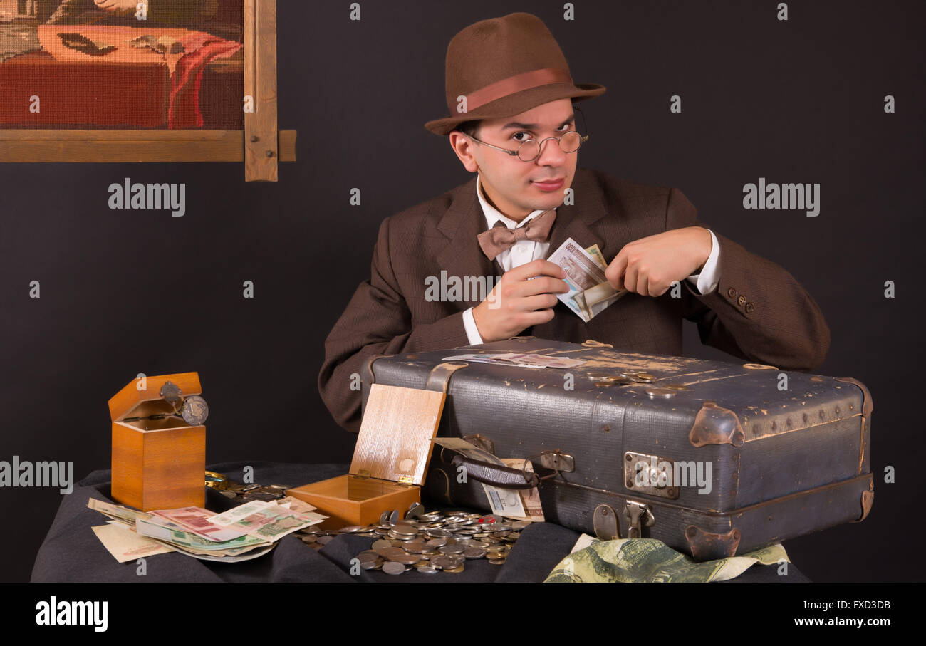 Numismatist with his coin collection Stock Photo Alamy