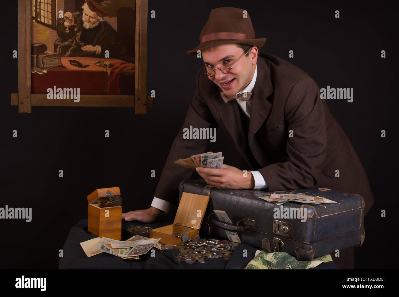 Numismatist with his coin collection Stock Photo Alamy