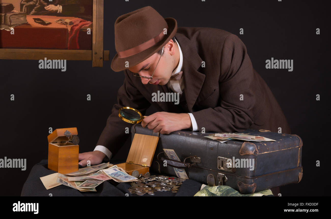 Numismatist with his coin collection Stock Photo Alamy