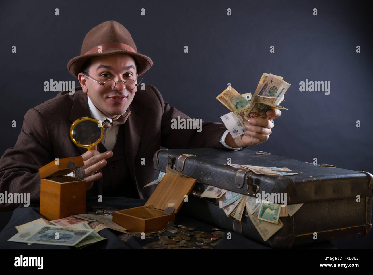 Numismatist with his coin collection Stock Photo Alamy
