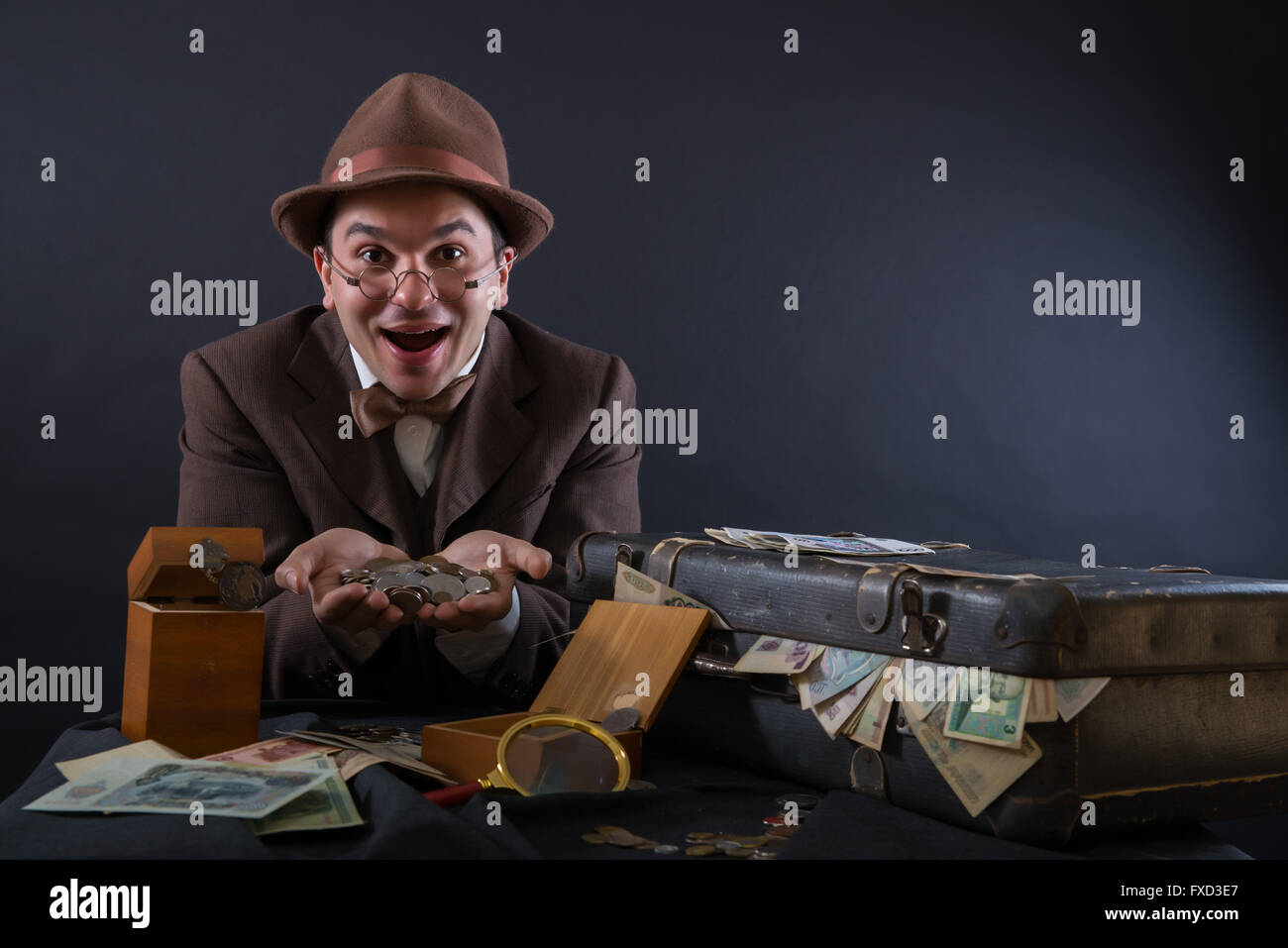 Numismatist with his coin collection Stock Photo Alamy