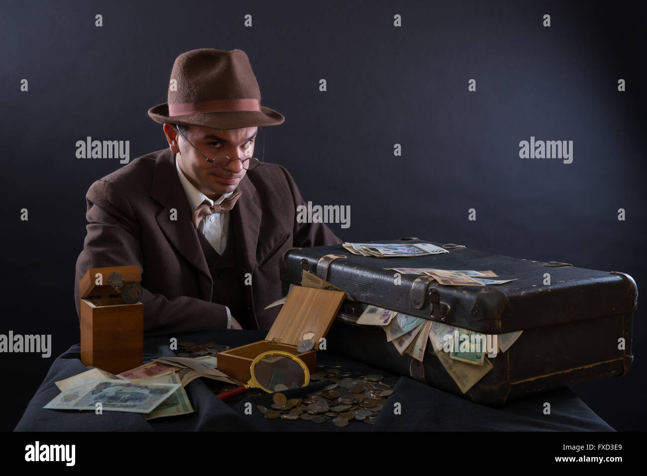 Numismatist with his coin collection Stock Photo Alamy