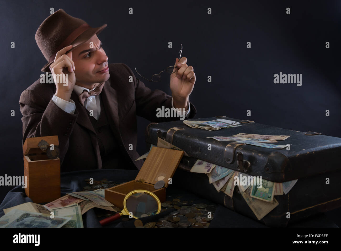 Numismatist with his coin collection Stock Photo Alamy