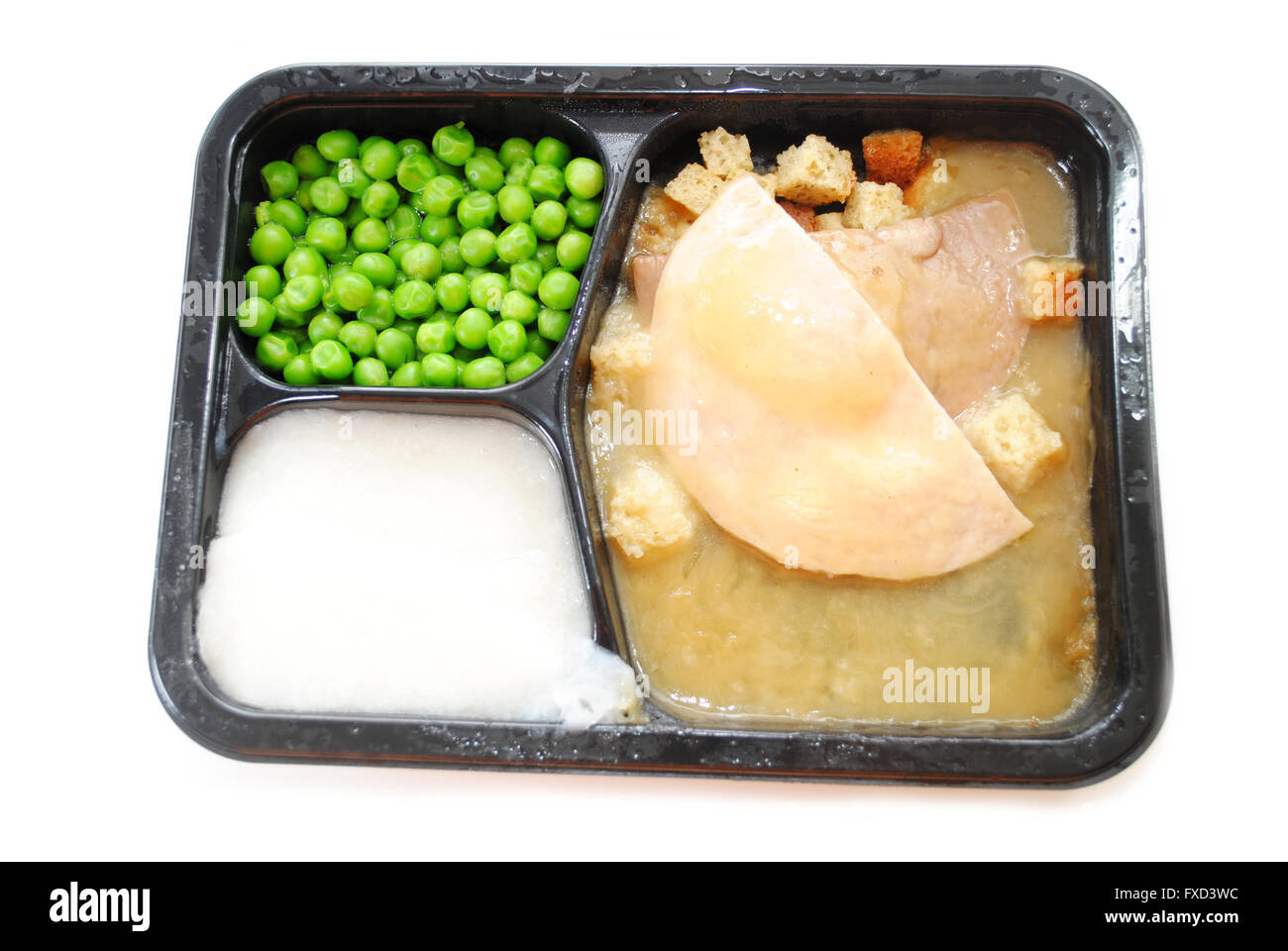 Microwavable Turkey TV Dinner Over White Stock Photo