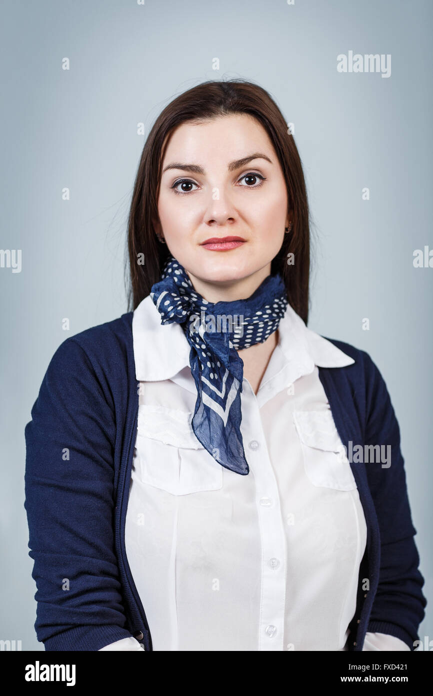 Young beautiful woman with serious face Stock Photo