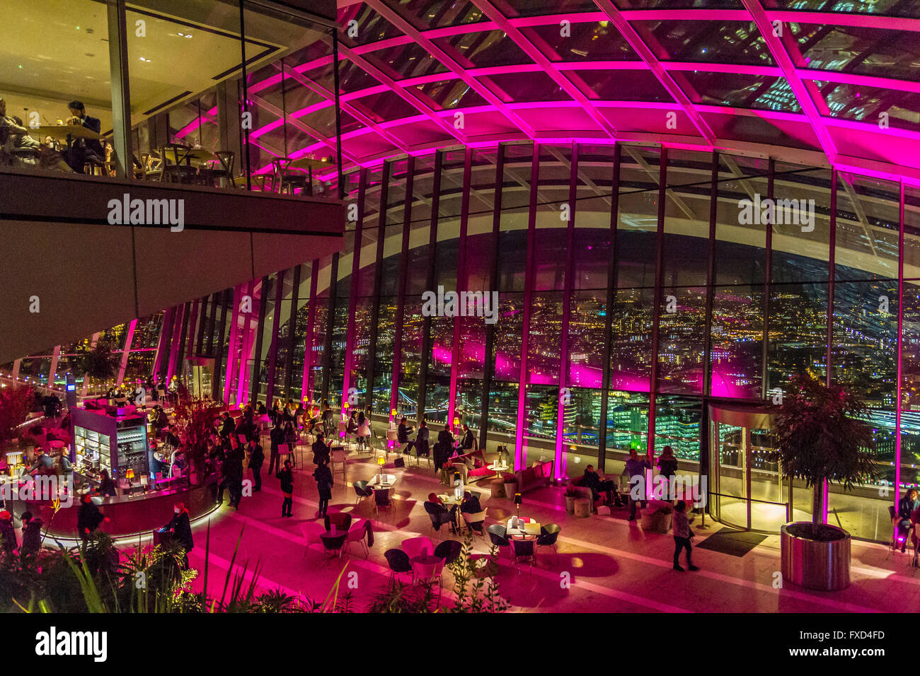 People Enjoying Drinks In The Evening At The Sky Pod Bar