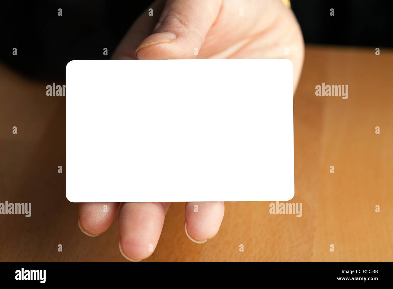 Hand Holding Blank Credit Card Stock Photo