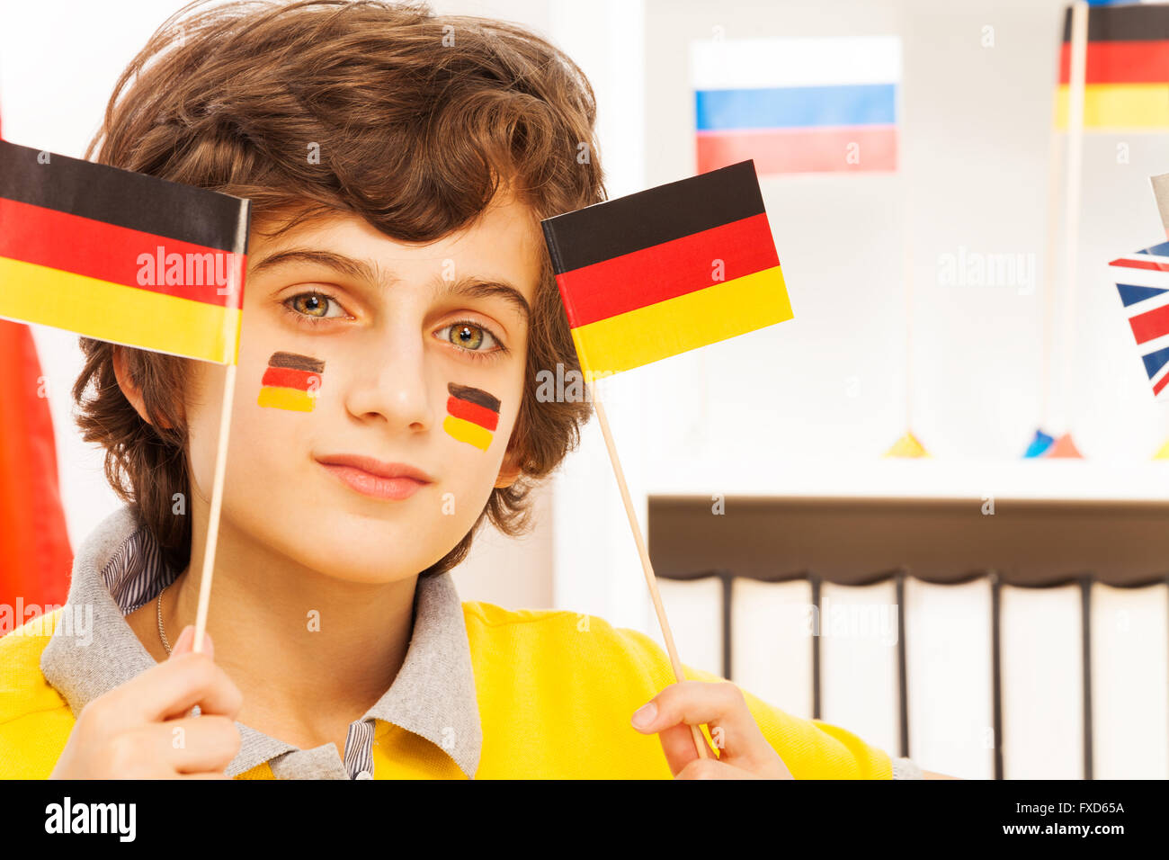 Close-up picture of German boy with flags Stock Photo
